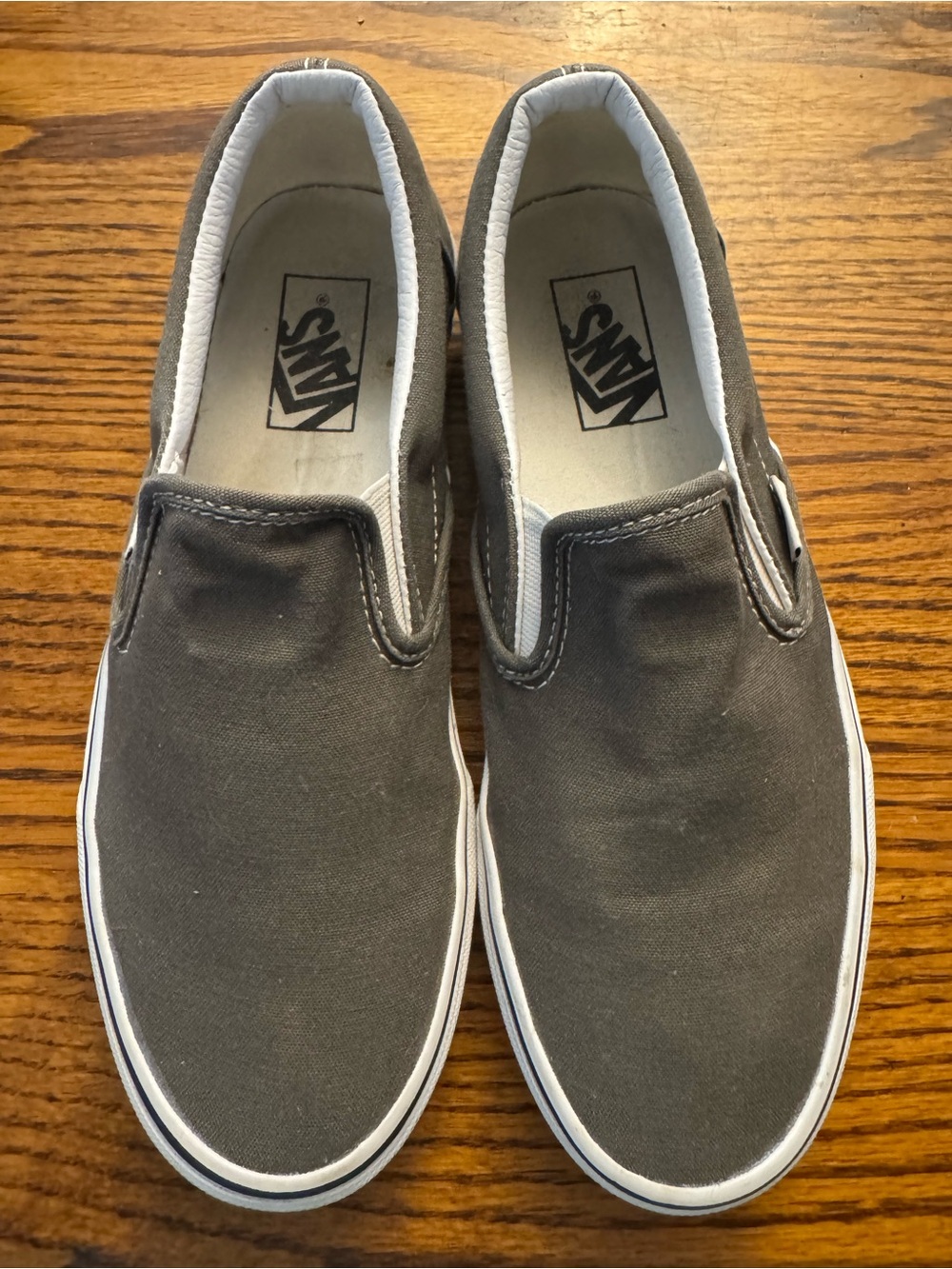 Vans Slip-On Canvas Sneakers in Charcoal and White